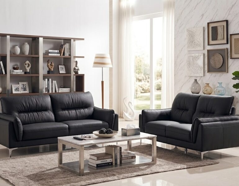 LA 5252 black top grain leather sofa and loveseat set with premium genuine leather upholstery and modern stainless steel legs.